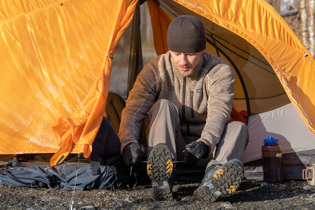 Fall hiking gear (putting on hiking boots)